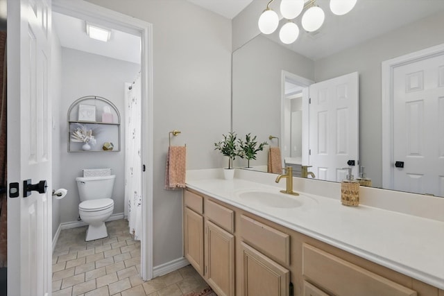 7205 Fair Valley Way, Plano, TX 75024 - bathroom featuring vanity, toilet, a chandelier, baseboards, and tile patterned floors