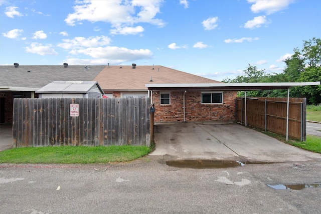 31 W Townhouse Ln Unit 20, Grand Prairie, TX 75052 - view of side of property with brick siding
