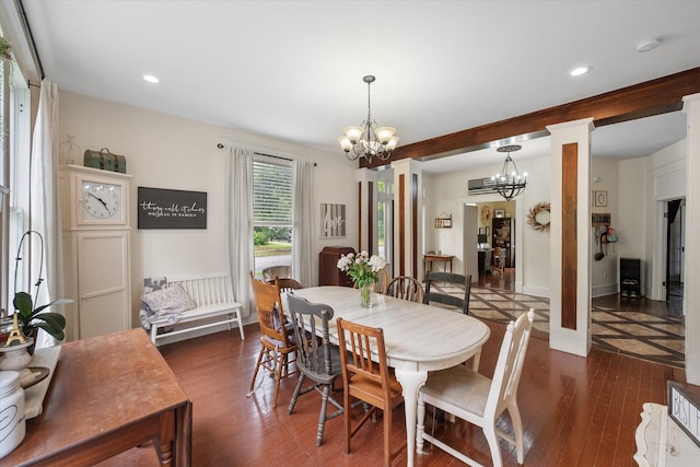 100 Corsicana St, Hillsboro, TX 76645 - dining space with a chandelier, dark wood finished floors, recessed lighting, and baseboards