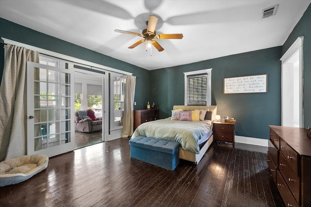 100 Corsicana St, Hillsboro, TX 76645 - bedroom featuring access to exterior, hardwood / wood-style floors, baseboards, and ceiling fan