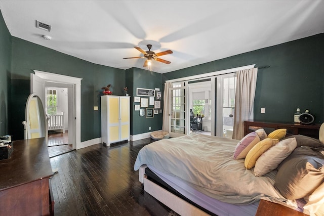 100 Corsicana St, Hillsboro, TX 76645 - bedroom with wood-type flooring, access to exterior, french doors, baseboards, and a ceiling fan