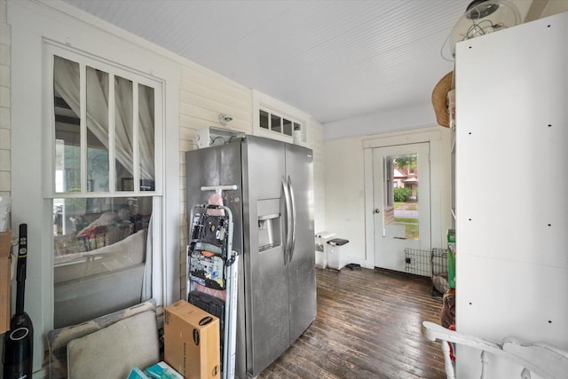 100 Corsicana St, Hillsboro, TX 76645 - kitchen with stainless steel fridge and dark wood finished floors