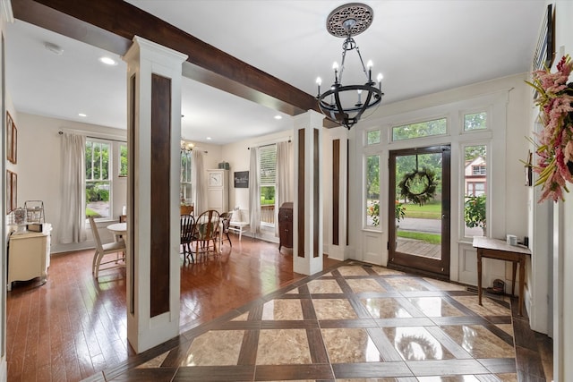 100 Corsicana St, Hillsboro, TX 76645 - foyer entrance featuring a chandelier, inlaid floor details, recessed lighting, and wood finished floors