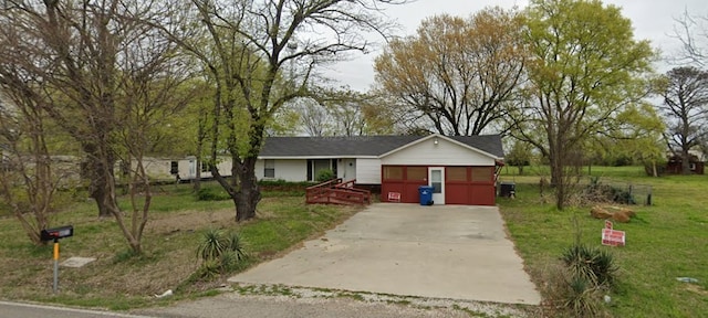 401 Frisco St, Cumby, TX 75433 - ranch-style home with driveway and a front lawn