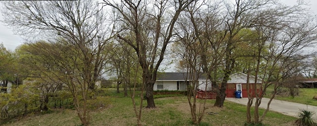 401 Frisco St, Cumby, TX 75433 - ranch-style house with driveway