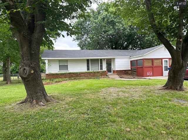 401 Frisco St, Cumby, TX 75433 - ranch-style house featuring a shingled roof, entry steps, and brick siding