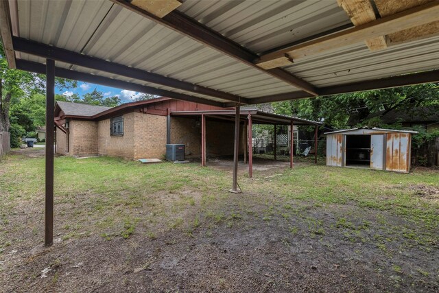 3406 Schwartz Ave, Fort Worth, TX 76106 - view of green lawn featuring central AC unit and a carport