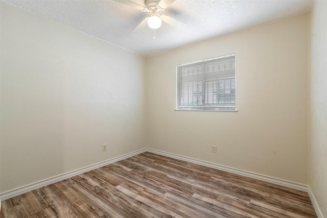 3406 Schwartz Ave, Fort Worth, TX 76106 - unfurnished room with wood finished floors, ceiling fan, baseboards, and a textured ceiling
