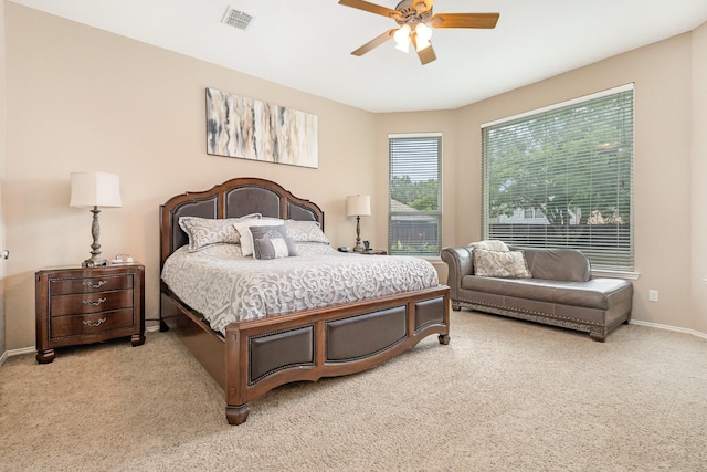 2916 Woods Dr, Plano, TX 75025 - bedroom featuring light carpet, ceiling fan, and baseboards