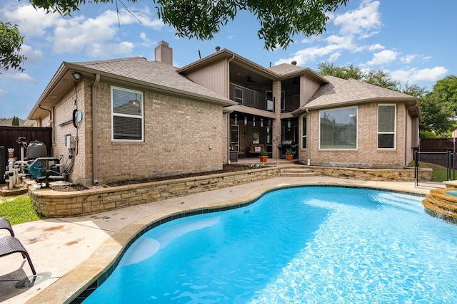 2916 Woods Dr, Plano, TX 75025 - view of swimming pool with a ceiling fan and a patio