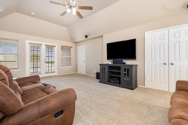 2916 Woods Dr, Plano, TX 75025 - carpeted living area featuring a ceiling fan, lofted ceiling, and baseboards