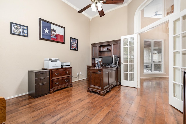 2916 Woods Dr, Plano, TX 75025 - office space featuring crown molding, a ceiling fan, dark wood-style floors, a towering ceiling, and baseboards