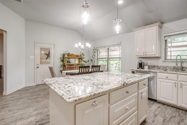 1017 Thistle Hill Trl, Weatherford, TX 76087 - kitchen featuring a sink, vaulted ceiling, dishwasher, a center island, and a chandelier