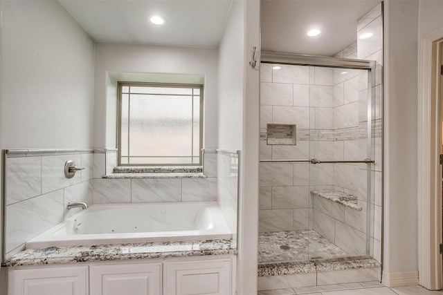 1017 Thistle Hill Trl, Weatherford, TX 76087 - full bathroom with a tub with jets, a shower stall, and recessed lighting