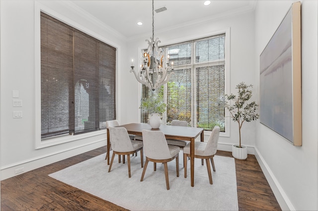 6644 Josephine St, Plano, TX 75024 - dining space featuring ornamental molding, plenty of natural light, wood finished floors, a chandelier, and baseboards