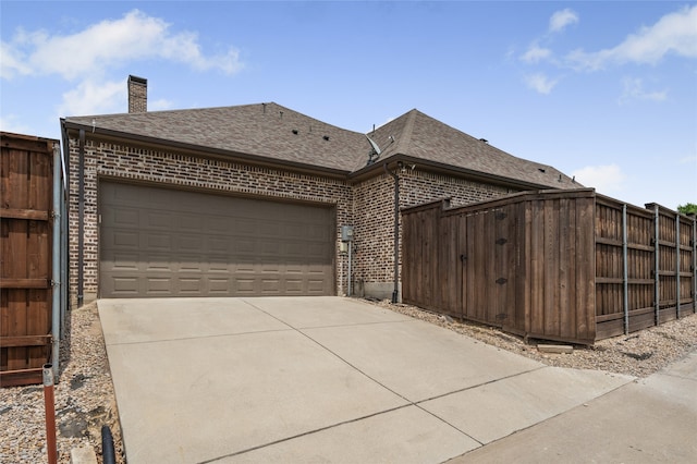 6644 Josephine St, Plano, TX 75024 - view of front of property featuring brick siding, a shingled roof, driveway, a garage, and a chimney