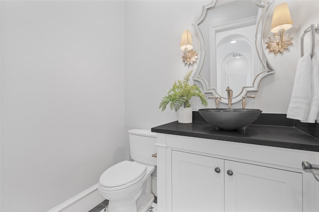 6644 Josephine St, Plano, TX 75024 - bathroom with vanity, toilet, and baseboards