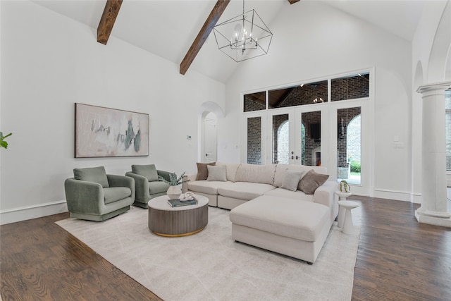 6644 Josephine St, Plano, TX 75024 - living room with arched walkways, a chandelier, high vaulted ceiling, wood finished floors, and beam ceiling