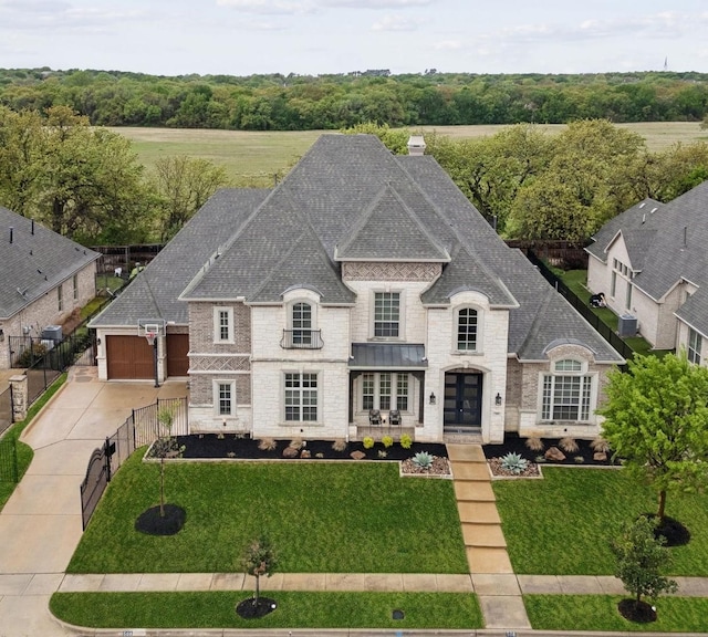 508 Cascade Springs Dr, Southlake, TX 76092 - french country home with driveway, roof with shingles, a chimney, brick siding, and an attached garage