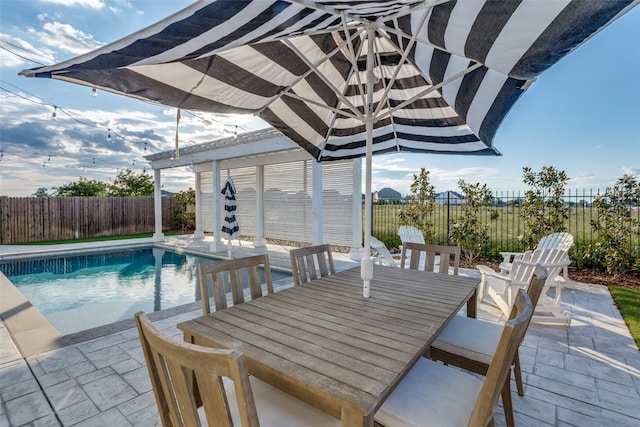 712 Tallgrass Dr, Aledo, TX 76008 - fenced backyard featuring a patio and outdoor dining space