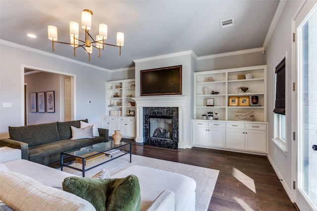 712 Tallgrass Dr, Aledo, TX 76008 - living room featuring a chandelier, a high end fireplace, dark wood finished floors, and ornamental molding