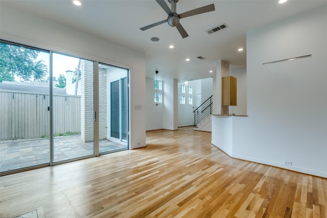 4302 Gilbert Ave, Dallas, TX 75219 - unfurnished room with ceiling fan, light wood finished floors, recessed lighting, stairs, and baseboards