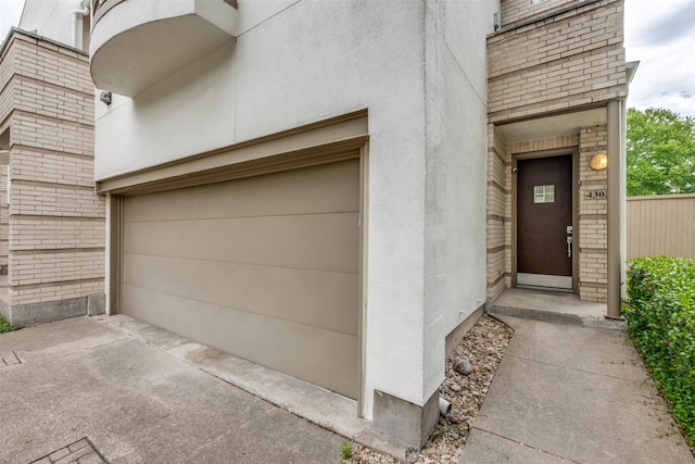 4302 Gilbert Ave, Dallas, TX 75219 - doorway to property with stucco siding