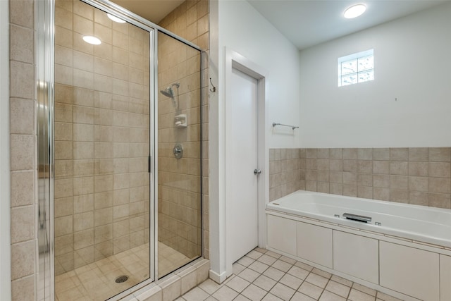 4302 Gilbert Ave, Dallas, TX 75219 - full bath featuring a shower stall, a bath, and tile patterned flooring