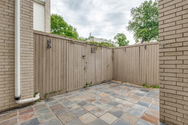 4302 Gilbert Ave, Dallas, TX 75219 - view of patio / terrace with a gate
