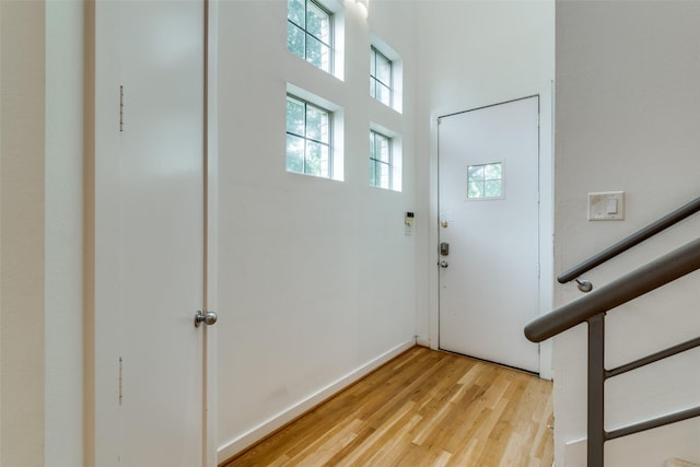 4302 Gilbert Ave, Dallas, TX 75219 - foyer with light wood finished floors and baseboards