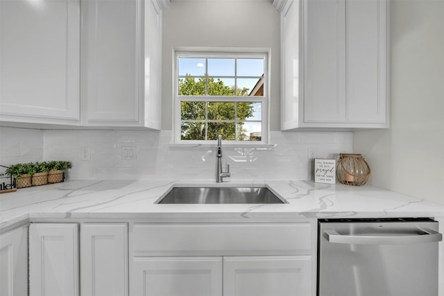 498 Cumberland Trl, Bridgeport, TX 76458 - kitchen featuring stainless steel dishwasher, a sink, decorative backsplash, white cabinets, and light stone counters