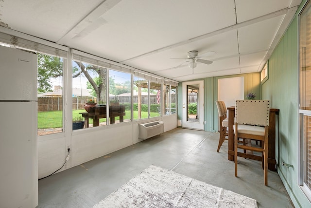 7529 Mapleleaf Dr, North Richland Hills, TX 76182 - sunroom featuring a ceiling fan and a wall mounted air conditioner