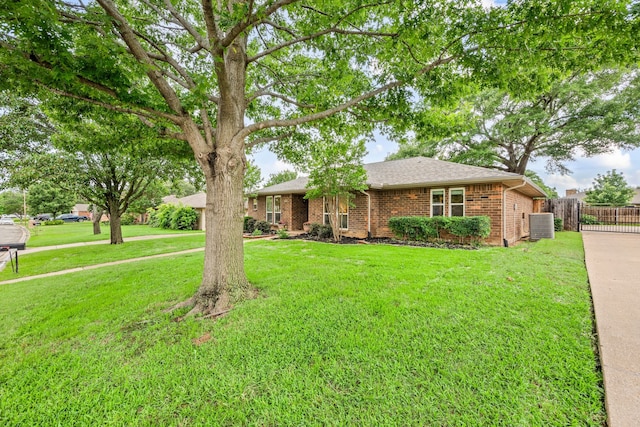 7529 Mapleleaf Dr, North Richland Hills, TX 76182 - ranch-style house featuring brick siding, central air condition unit, and a shingled roof