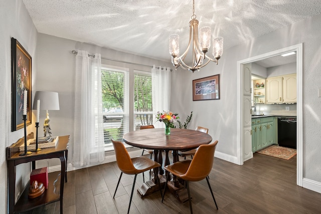 7529 Mapleleaf Dr, North Richland Hills, TX 76182 - dining area featuring a chandelier, dark wood-style floors, a textured ceiling, and baseboards