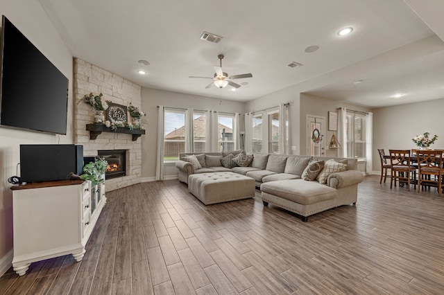 1120 Pinnacle Ridge Rd, Fort Worth, TX 76052 - living area featuring a fireplace, ceiling fan, wood finished floors, baseboards, and recessed lighting