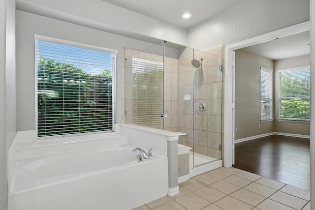 3412 Hofstra Dr, Denton, TX 76210 - full bathroom with a bath, healthy amount of natural light, a stall shower, and tile patterned floors