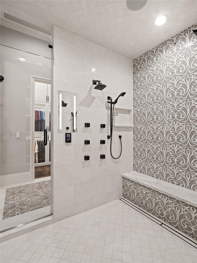 4905 Reserve Ct, Parker, TX 75002 - bathroom with tiled shower, a spacious closet, tile patterned floors, recessed lighting, and tile walls