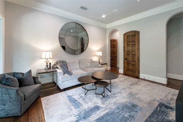 4905 Reserve Ct, Parker, TX 75002 - living area with arched walkways, wood finished floors, baseboards, crown molding, and recessed lighting