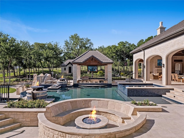 4905 Reserve Ct, Parker, TX 75002 - outdoor pool featuring an in-ground hot tub, a fire pit, a patio area, and a gazebo