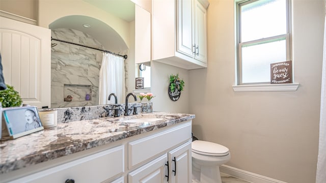 9000 Parkview Cir, Tolar, TX 76476 - full bath with vanity, toilet, plenty of natural light, and a shower with curtain