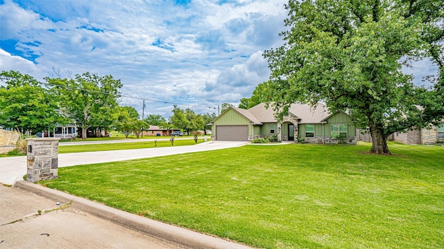 9000 Parkview Cir, Tolar, TX 76476 - view of front of home featuring driveway, a front lawn, board and batten siding, a garage, and a shingled roof