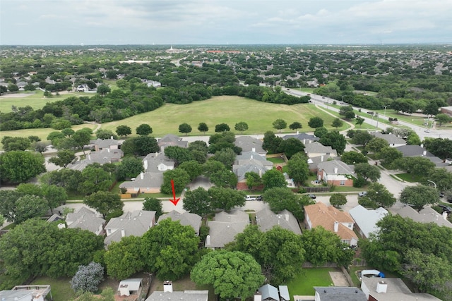 7421 Buckskin Ct, Fort Worth, TX 76137 - aerial perspective of suburban area with a tree filled landscape