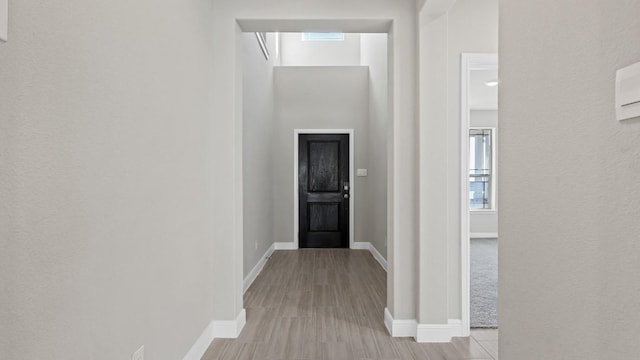 11213 Orchard Ln, Justin, TX 76247 - hall with baseboards and light wood finished floors