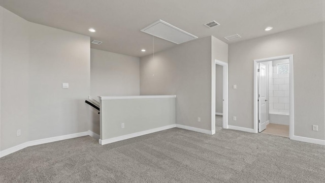 11213 Orchard Ln, Justin, TX 76247 - carpeted spare room featuring attic access, recessed lighting, and baseboards