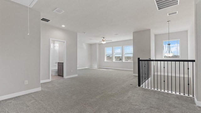 11213 Orchard Ln, Justin, TX 76247 - empty room featuring carpet floors, baseboards, attic access, a ceiling fan, and recessed lighting