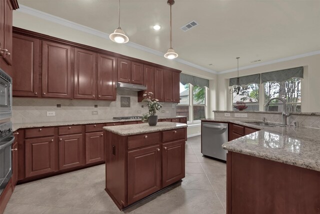 621 Maize Rd, Murphy, TX 75094 - kitchen with stainless steel appliances, a center island, a sink, backsplash, and under cabinet range hood