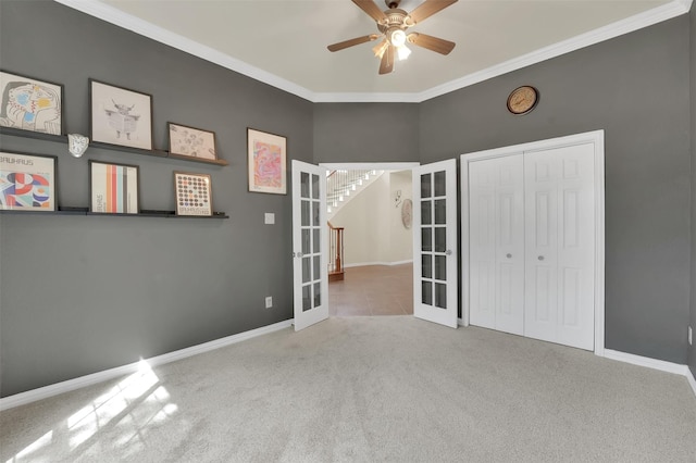 621 Maize Rd, Murphy, TX 75094 - unfurnished bedroom with carpet, french doors, ornamental molding, baseboards, and ceiling fan
