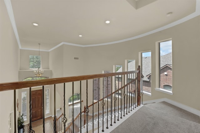 621 Maize Rd, Murphy, TX 75094 - corridor with an upstairs landing, crown molding, a chandelier, baseboards, and recessed lighting