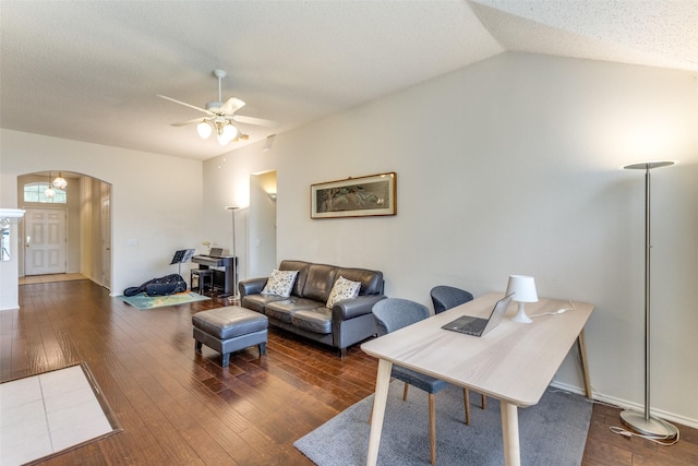 2401 Loon Lake Rd, Denton, TX 76210 - living room featuring arched walkways, a ceiling fan, hardwood / wood-style flooring, and vaulted ceiling