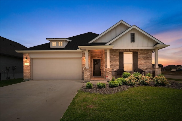 1713 Brindle St, Justin, TX 76247 - view of front of property featuring brick siding, concrete driveway, an attached garage, board and batten siding, and a yard